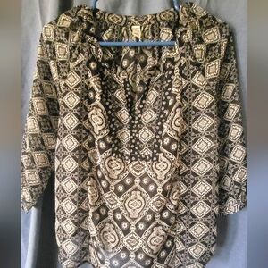 White and black print sheer blouse.